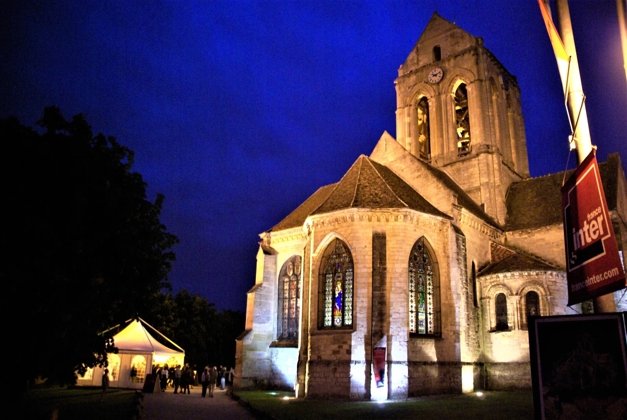 The church of Notre-Dame d'Auvers-sur-Oise illuminated on a Festival evening